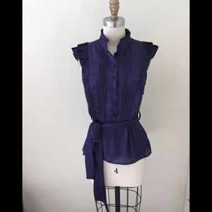 Purple sleeveless blouse